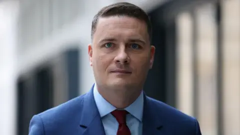 Reuters Health Secretary Wes Streeting looks towards camera as he arrives at BBC Broadcasting House,