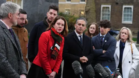 PA Media Bereaved families of the Nottingham attacks outside Number 10 Downing Street