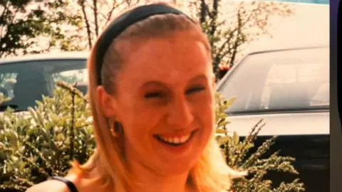 Sabrina Lyttle, pictured in her 20s, smiles at the camera.