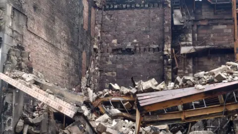 Glasgow City Council The ruins of a building wrecked by fire