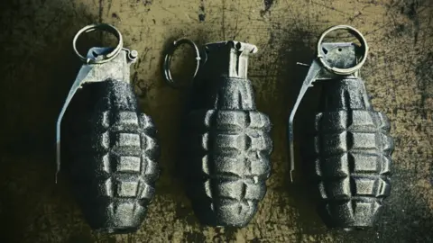 A trio of hand grenades 