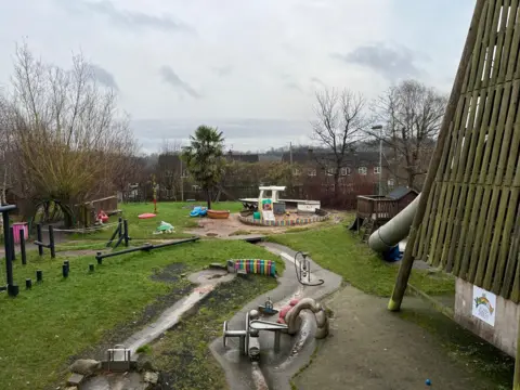 A park and slide outside the sycamore centre 