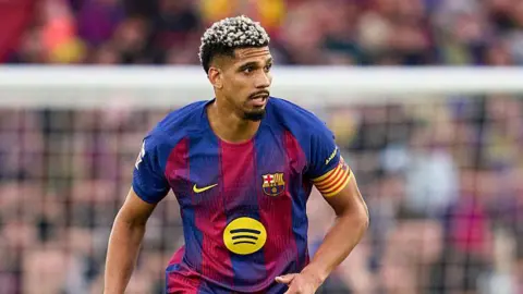 Ronald Araujo looks on while playing for Barcelona against Espanyol in April 2026