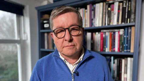 Julian Hendy from the charity Hundred Families 