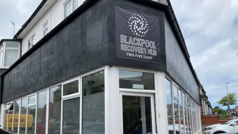 The sign for Blackpool Recovery Hub on the top of the hub