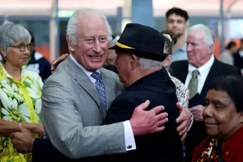 Reuters King Charles meets Uncle James Michael 'Widdy' Welsh, a member of the Indigenous community, during a visit to the National Centre of Indigenous Excellence in Sydney, Australia