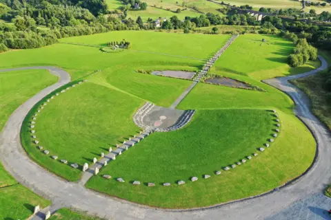 Mike Bolam An aerial view of the Crawick Multiverse with standing stones in a semi-circle form an amphitheatre with a pathway leading towards it