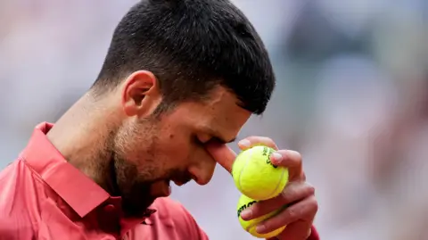 Novak Djokovic reacts during his French Open win over Francisco Cerundolo