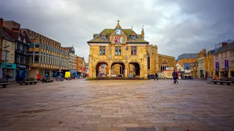 Cathedral square in Peterborough, with the Guildhall in the centre of image. 