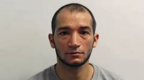 Police mugshot of Scott Ijomanta