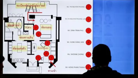 Reuters A screen displays the crime scene diagram during a presser following a case of six foreign nationals who were found dead inside a room at Grand Hyatt Erawan Hotel at Lumpini Police Station, in Bangkok, Thailand, July 17, 2024