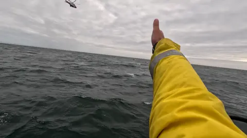 Portpatrick RNLI Helicopter in the sky