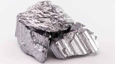 Getty Images A lump of silver metal on a white background