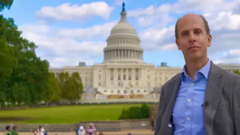 Anthony Zurcher in front of the Capitol building