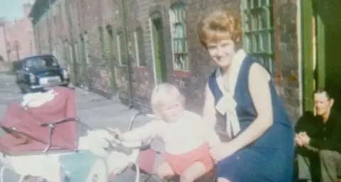 Nottinghamshire Police Mr Swinscoe, seen sitting on the step, pictured with Mr Lowbridge and Julie Swinscoe