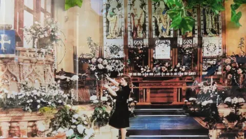June the Florist An old colour photograph of Bessie preparing flowers in a church 