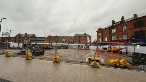 Nottingham City Council Bulwell Market Place, showing the central area fenced off for construction work