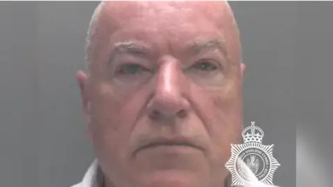 North Wales Police Neil Foden has abbreviated  grey hairsbreadth  and grey eyebrows