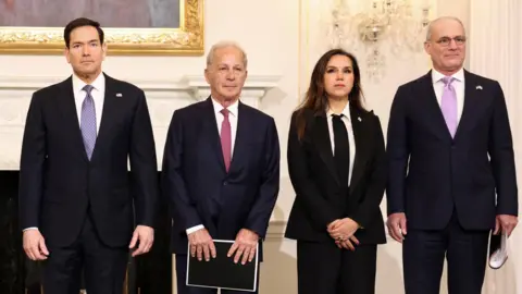 Reuters US Secretary of State Marco Rubio (L), US ambassador to Lebanon Michel Issa (2nd L), Lebanese Ambassador to the US Nada Moawad (2nd R), and Israeli ambassador to the US Yechiel Leiter (R) pose for a photo before their meeting at the State Department in Washington (14 April 2026)