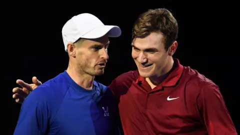 Getty Images Andy Murray of Scotland (L), reacts as wins his match with Jack Draper of England during day one of the Battle of the Brits 