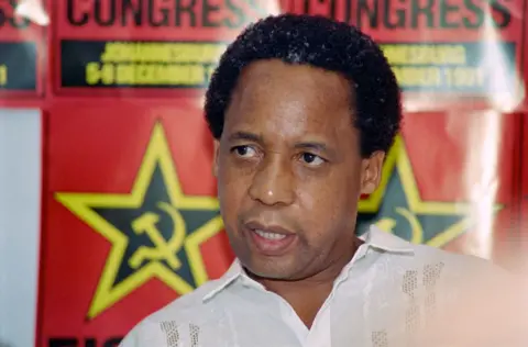 AFP Chris Hani wearing a white shirt 