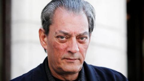 US author Paul Auster poses for a photograph before an interview in Stockholm May 10, 2011.