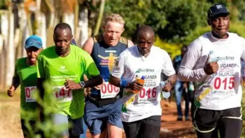 FRANK WAINWRIGHT Frank Wainwright running 