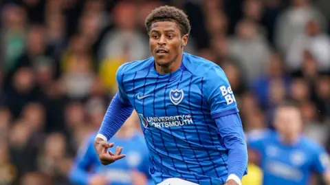 Australian striker Kusini Yengi in action for Portsmouth