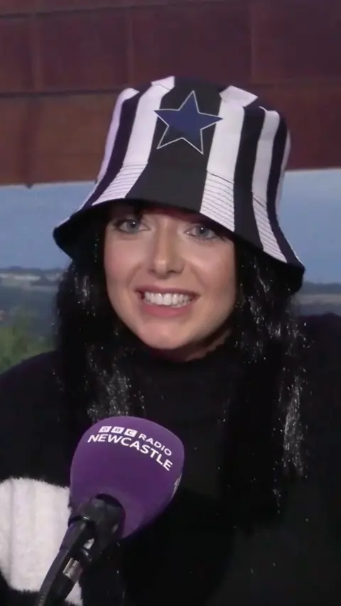 Laura Fulgenzi...aka Geordia Winklehereman in the Radio Newcastle studio in a Newcastle United bucket hat