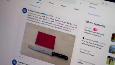 Twitter An old social media post by the Met's Roads and Transport account showing a picture of a knife with a serrated edge. The accompanying text says it was seized during a weapon sweep in N17 and a small amount of drugs were also found 