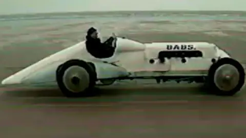 The rebuilt record-breaking car BABS being driven on Pendine Sands