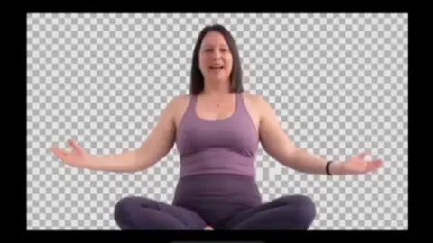 Jill Salt A still from a video featuring Jill Salt in purple yoga outfit in a yoga-like pose