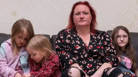 Anthony Luvera Sylvi Vaisanen with three of her children