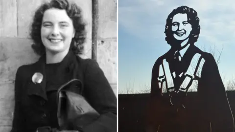 IBCC A black and white photo of Dorothy who carries a black leather bag, gloves and wears a black coat with a brooch.  Her hair is styled in the short and curly 1940's fashion and she smiles for the camera.