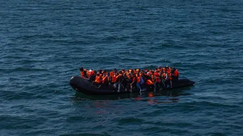 People in a dingy