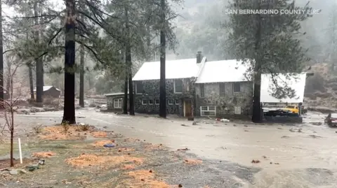 Reuters A house is submerged by flood waters in San Bernardino 
