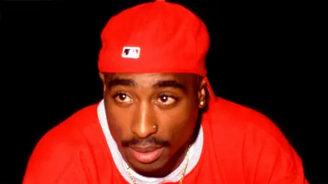 Tupac Shakur is seen.