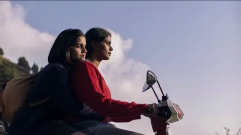 Preeti Panigrahi and Kani Kusruti in a still from Girls will be Girls