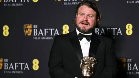 Getty Images Brady Corbet at the Bafta Film Awards