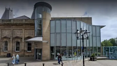 Google The outside of Sunderland Museum and Winter Gardens with people walking past