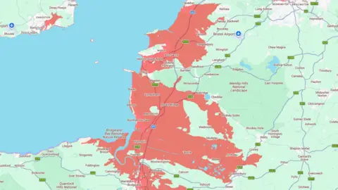 Climate Central A map showing areas in North Somerset as red when they are at risk of flooding.