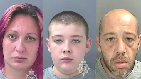 South Wales Police Mug shots of a woman with pink hair, a teenage boy and a balding man. They're in police custody wearing grey jumpers. 