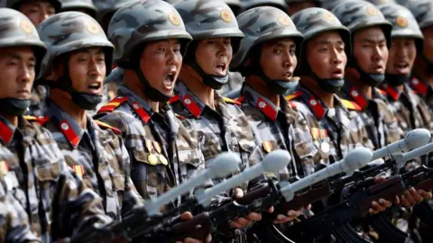 Reuters North Korean soldiers march during a parade in Pyongyang, North Korea. Photo: April 2017