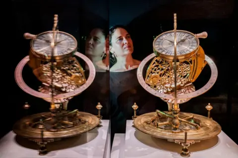 Jane Barlow/PA Media Principal curator of science Dr Rebekah Higgitt alongside the Ilay Glynne sundial at the National Museum of Scotland in Edinburgh. July 25, 2024