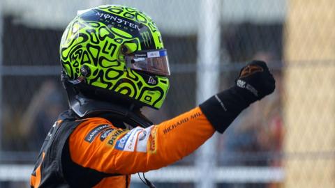 Lando Norris punches the air in celebration after winning the Miami Grand Prix