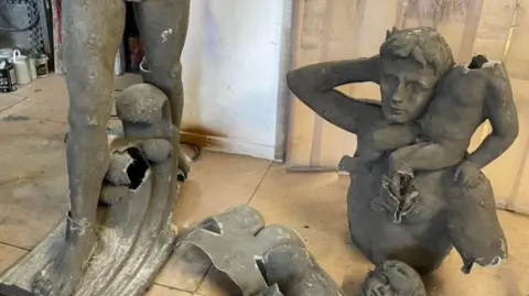 Will Hennessy Broken up statues