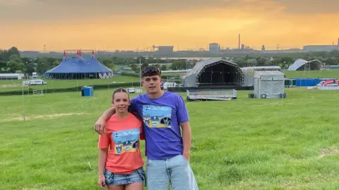 Charlie Williams  Siblings at a festival 