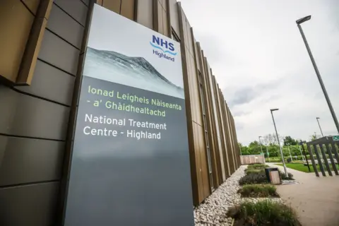 A sign saying National Treatment Centre - Highland