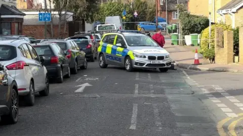 A silver police car