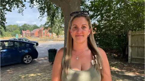Kerry Leggett looks straight at the camera